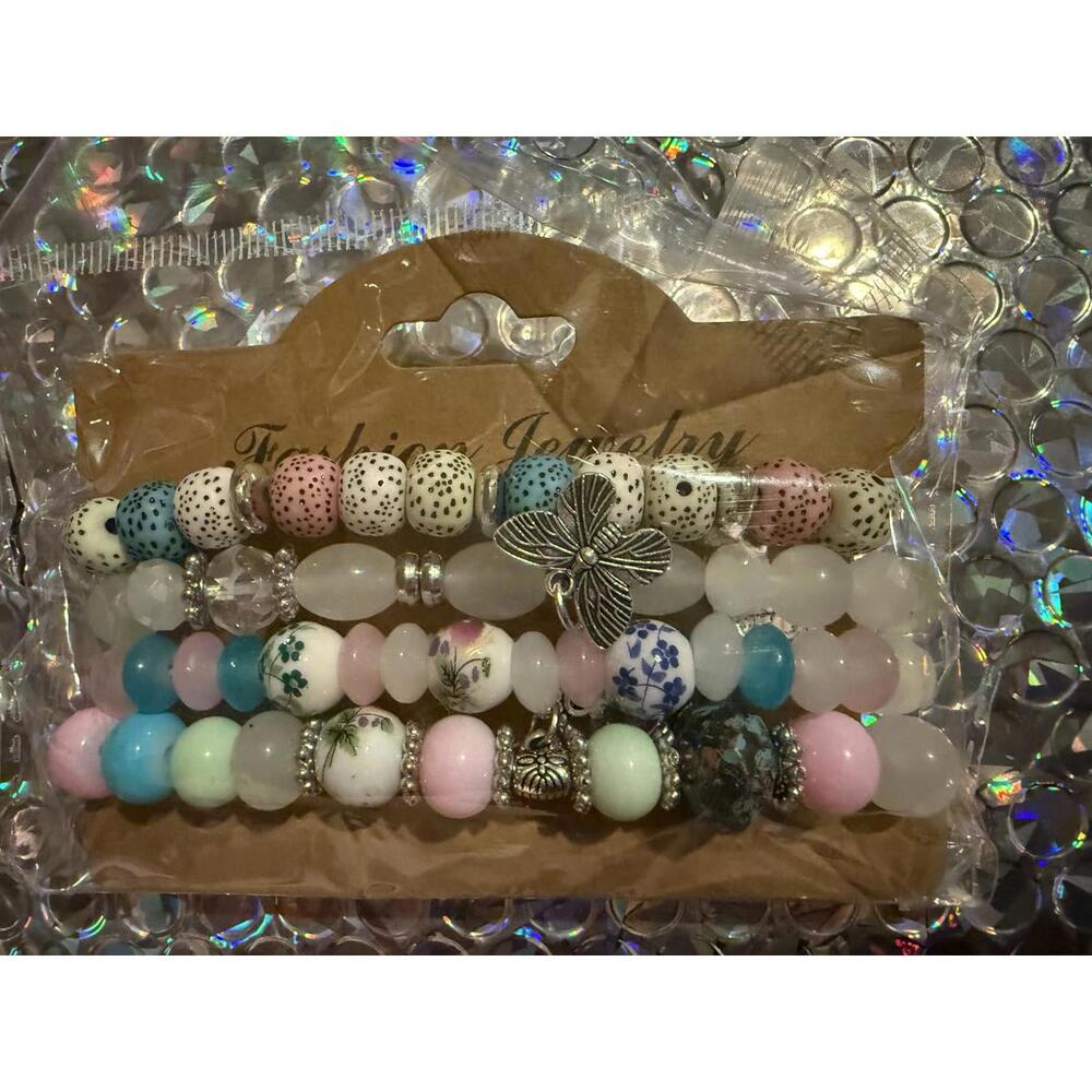 Set of 4 Colorful Beaded Bracelets with Floral and Butterfly Accents New